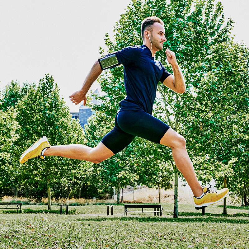 A man runs on a grass 800x800